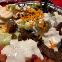Photo taken at The Halal Guys by Aaron T. on 5/26/2018