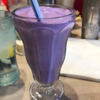Photo taken at Purple Cow by Charlie W. on 3/3/2018