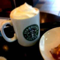 Photo taken at Starbucks Coffee JR八王子駅前店 by Mizuki N. on 10/6/2012