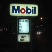 Photo taken at Mobil by Jason B. on 11/1/2012