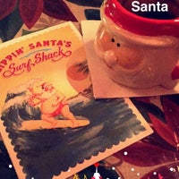 Photo taken at Sippin&#39; Santa&#39;s Surf Shack by Josh F. on 12/16/2015