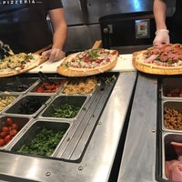 Photo taken at Pieology Pizzeria by Amir Q. on 2/18/2018