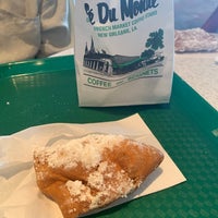 Photo taken at Café Du Monde by Tanisha R. on 6/25/2022