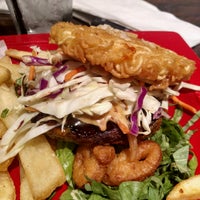 Photo taken at Red Robin Gourmet Burgers and Brews by Richard H. on 7/31/2016