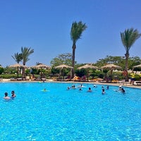 Photo taken at Aqua at Hilton Hurghada Long Beach Resort by Владимир И. on 6/18/2015