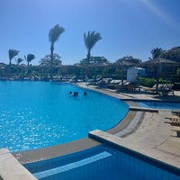 Photo taken at Aqua at Hilton Hurghada Long Beach Resort by Владимир И. on 6/13/2015