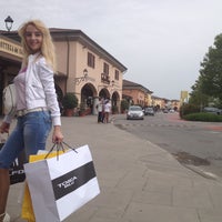 Photo taken at Franciacorta Outlet Village by Roman S. on 5/1/2013