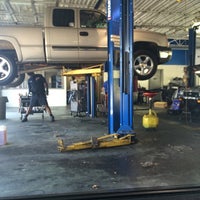 Photo taken at Express Oil Change &amp;amp; Tire Engineers by Aziz A. on 4/10/2014