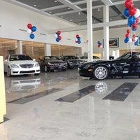 Photo taken at Flagship Motorcars by Maria A. on 2/19/2013