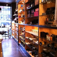 Photo taken at Revolucion Cigars and Gifts by Agnès T. on 3/15/2012