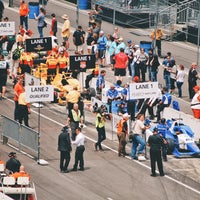 Photo taken at IMS Oval Turn One by Jayna W. on 5/17/2015