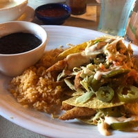 Foto diambil di La Parrilla Mexican Restaurant oleh TJ pada 11/30/2019