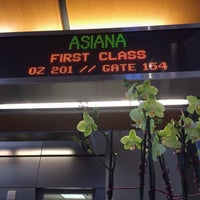 Photo taken at Asiana Airlines Check-In by WorldTravelGuy on 2/27/2014