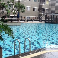 Photo taken at Poolside Tower A - Sudirman Park Apartment by Chika Zulyani K. on 11/18/2012
