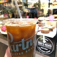 Photo taken at Partners Coffee Roasters by Angela W. on 6/3/2019