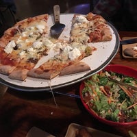 Photo taken at Roots Handmade Pizza by Sara B. on 1/1/2020