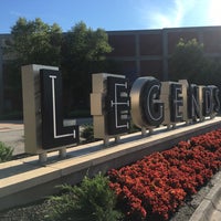 Photo taken at Legends Outlets Kansas City by Chris on 7/8/2016