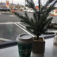 Photo taken at Starbucks by Kenichi W. on 12/9/2018