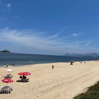 Photo taken at Praia de Camboinhas by Crixt O. on 10/29/2022