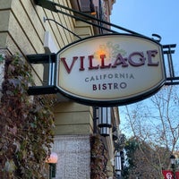 Foto diambil di Village California Bistro &amp;amp; Wine Bar oleh Beth R. pada 1/1/2019