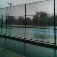 Photo taken at Crotona Park tennis courts by andre r. on 7/15/2014