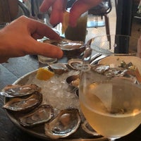 Photo taken at Dylan&amp;#39;s Oyster Cellar by Sam M. on 7/10/2021