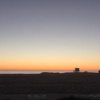 Photo taken at Venice Beach Volleyball Courts by Junior E. on 11/8/2014