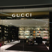 Photo taken at Gucci by Foodporn1 on 1/3/2013