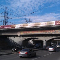 Photo taken at Мост по улице Нансена by Mihail K. on 10/14/2012