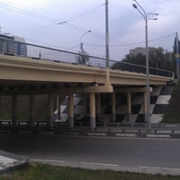 Photo taken at Мост через пр.Сиверса на Красноармейской by Mihail K. on 10/5/2012