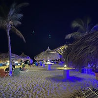 Photo taken at Passions Beach Bar by Alan S. on 7/6/2023