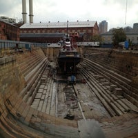 Photo taken at Brooklyn Navy Yard Dry Dock 1 by Brian B. on 10/6/2012
