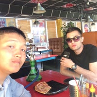 Photo taken at Pizza Shuttle by Бато Г. on 6/5/2016