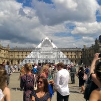 Photo taken at Louvre Pyramid by Fynn i. on 6/25/2016