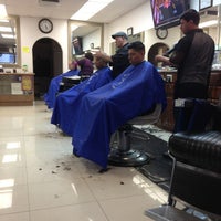 Photo taken at Manny&amp;#39;s Barber Shop by M L. on 3/6/2013