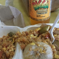 Photo taken at Golden Krust Caribbean Restaurant by Tineal on 6/18/2013