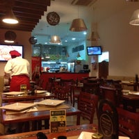 Photo taken at RedSun Pizza by Beto L. on 12/14/2012