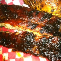 Photo taken at Famous Dave&amp;#39;s by Lisa C. on 12/21/2012