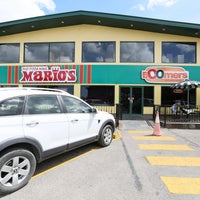 Photo taken at Mario&amp;#39;s Pizza Marabella by Mario&amp;#39;s Pizza on 8/10/2014