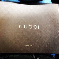 Photo taken at Gucci by Паша К. on 10/21/2014