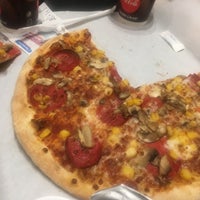 Photo taken at Domino&amp;#39;s Pizza by Murat Ö. on 12/16/2018