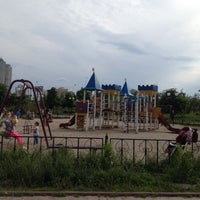 Photo taken at Детская Площадка (парк Позняки) by Kate L. on 5/14/2014