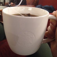 Photo taken at Starbucks by Eveline M. on 12/11/2014