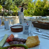 Photo taken at Tenekeli Restaurant by Serkan E. on 8/10/2021