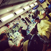 Photo taken at Dominguez Barbershop by Hector A. on 12/31/2012