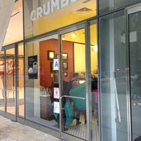 Photo taken at Crumbs Bake Shop by Laurent R. on 10/7/2012
