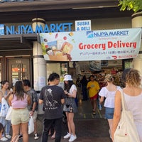 Photo taken at Nijiya Market by Cara Cara O. on 6/26/2022