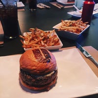 Photo taken at Umami Burger by Kim O. on 5/5/2015