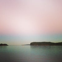 Photo taken at Departure Bay Beach by Charlotte K. on 9/12/2013