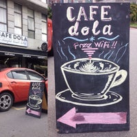 Foto tirada no(a) Cafe Dola por Andy C. em 12/15/2015